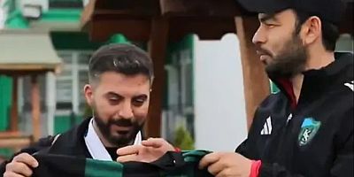 Selçuk Hocadan Hasan'a forma hediyesi